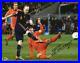 Andres_Iniesta_Spain_Autographed_11_x_14_Kicking_Photograph_01_qv