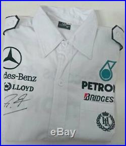 Original shirt, Mercedes Benz F1 team signed by Micheal Schumacher with COA